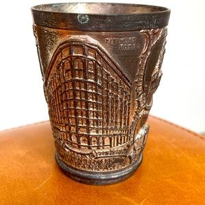 Very vintage souvenir of Atlanta heavy pencil cup with landmarks. Old patina
